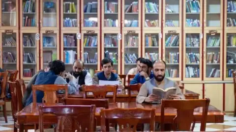 Afghanistan's rulers outlaw publications written by women from the nation's universities